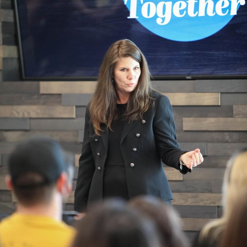 nancy duarte on stage speaking at an event