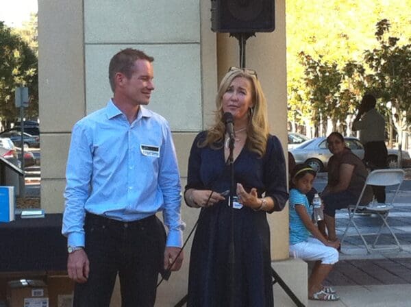 Jennifer Aaker and her husband Andy Smith speaking