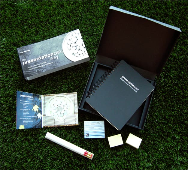 "The PresentationZen" box opened. Inside is a dvd and a notebook. 