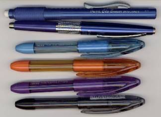 Several multi colored pens